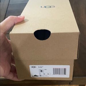 NIB UGG sandals. Black and gold size 8.